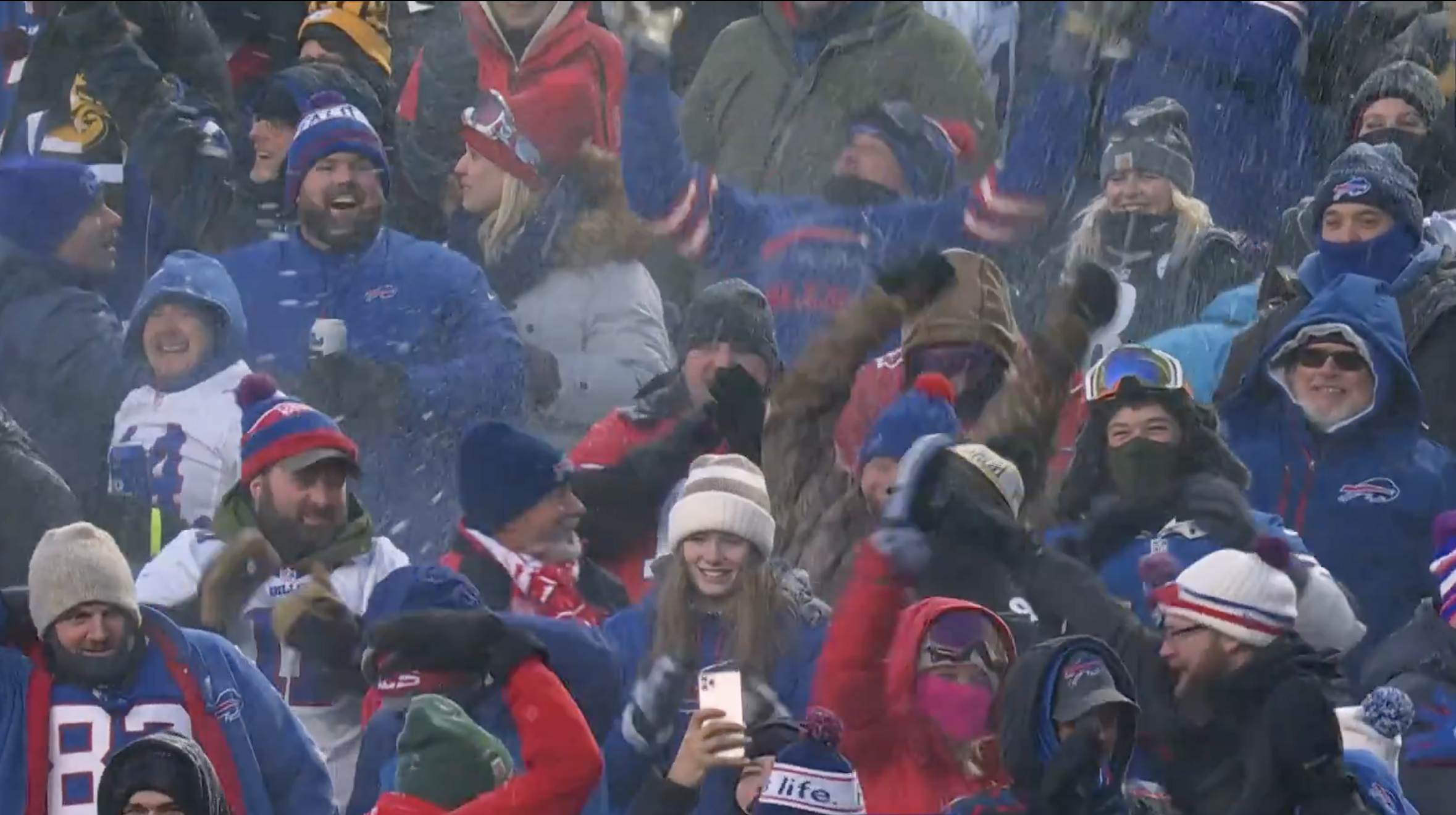 Bills fans throwing snow.